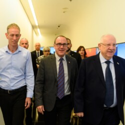 Israeli President Reuven (Ruvi) Rivlin meets with BGU President Prof. Daniel Chamovitz, Prof. Yuval Elovici, Prof. Dan Blumberg and Be'er Sheva Mayor Ruvik Danilovich at the Telekom Innovation Laboratories 
at Ben-Gurion University