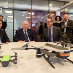 Israeli President Reuven (Ruvi) Rivlin meets with BGU President Prof. Daniel Chamovitz, Prof. Yuval Elovici, Prof. Dan Blumberg and Be'er Sheva Mayor Ruvik Danilovich at the Telekom Innovation Laboratories 
at Ben-Gurion University