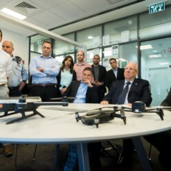 Israeli President Reuven (Ruvi) Rivlin meets with BGU President Prof. Daniel Chamovitz, Prof. Yuval Elovici, Prof. Dan Blumberg and Be'er Sheva Mayor Ruvik Danilovich at the Telekom Innovation Laboratories 
at Ben-Gurion University