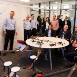 Israeli President Reuven (Ruvi) Rivlin meets with BGU President Prof. Daniel Chamovitz, Prof. Yuval Elovici, Prof. Dan Blumberg and Be'er Sheva Mayor Ruvik Danilovich at the Telekom Innovation Laboratories 
at Ben-Gurion University