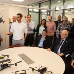 Israeli President Reuven (Ruvi) Rivlin meets with BGU President Prof. Daniel Chamovitz, Prof. Yuval Elovici, Prof. Dan Blumberg and Be'er Sheva Mayor Ruvik Danilovich at the Telekom Innovation Laboratories 
at Ben-Gurion University