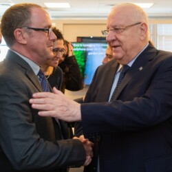 Israeli President Reuven (Ruvi) Rivlin meets with BGU President Prof. Daniel Chamovitz, Prof. Yuval Elovici, Prof. Dan Blumberg and Be'er Sheva Mayor Ruvik Danilovich at the Telekom Innovation Laboratories 
at Ben-Gurion University