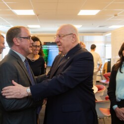 Israeli President Reuven (Ruvi) Rivlin meets with BGU President Prof. Daniel Chamovitz, Prof. Yuval Elovici, Prof. Dan Blumberg and Be'er Sheva Mayor Ruvik Danilovich at the Telekom Innovation Laboratories 
at Ben-Gurion University